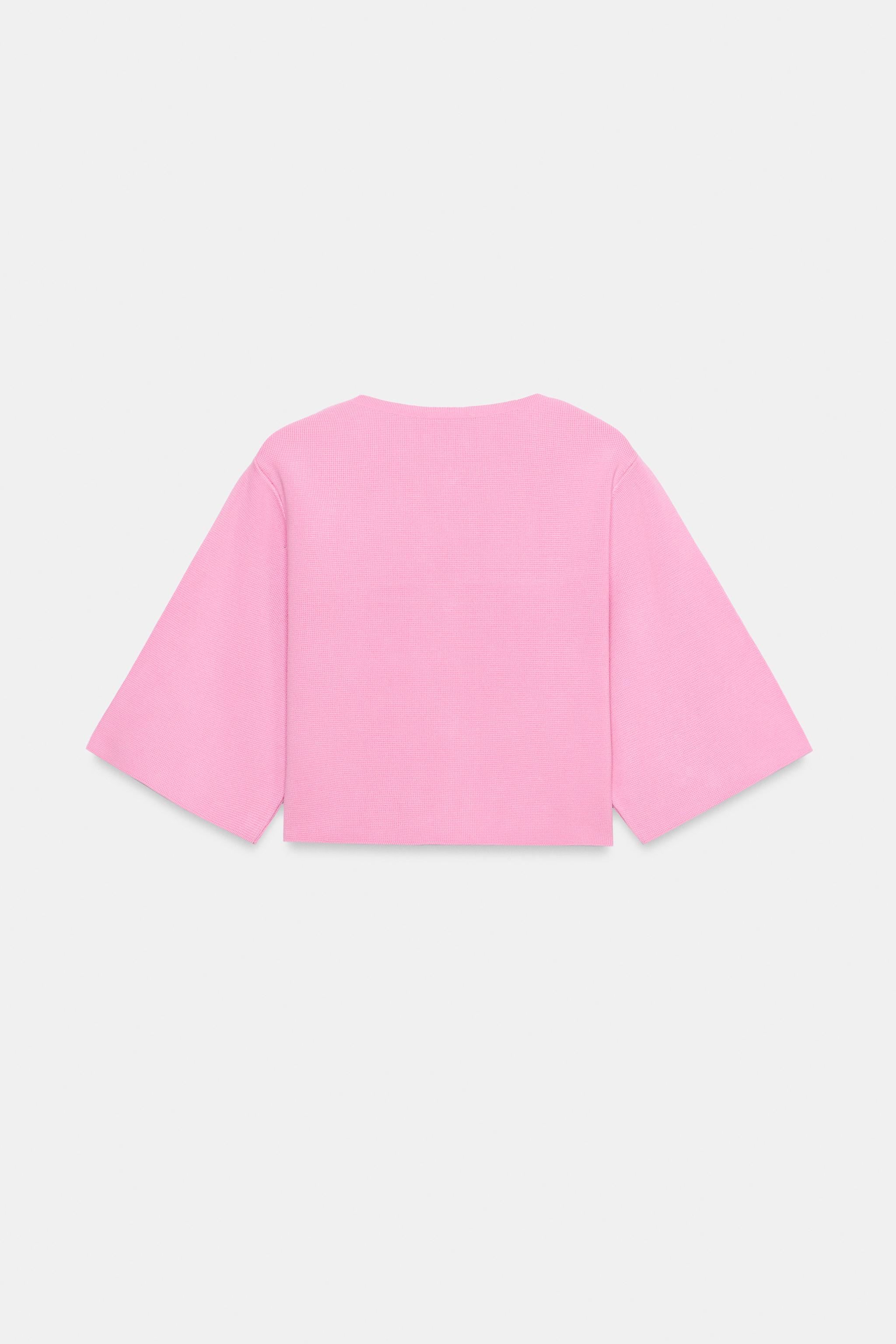 GILET EN MAILLE AVEC BOUTON RECOUVERT